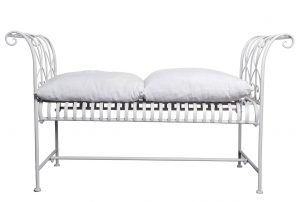 White metal bench with cushion